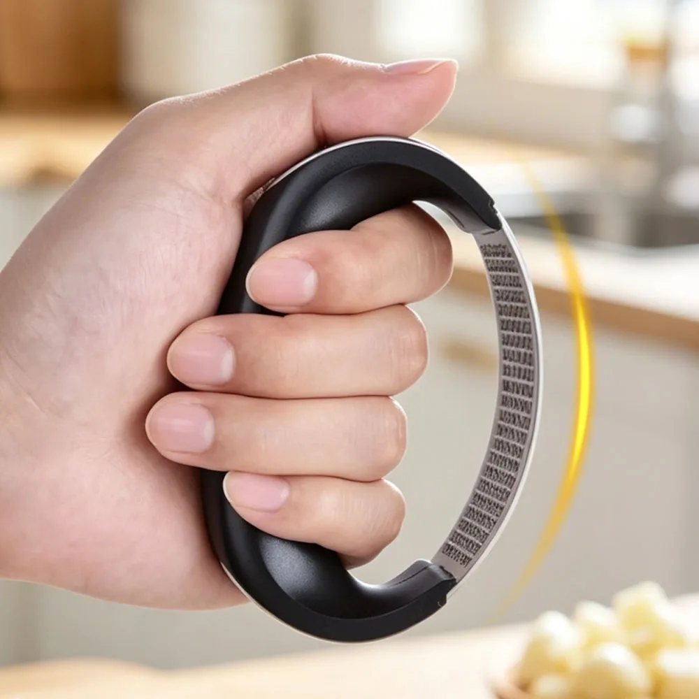 Curved rocker profile of stainless steel garlic press — open self-cleaning structure